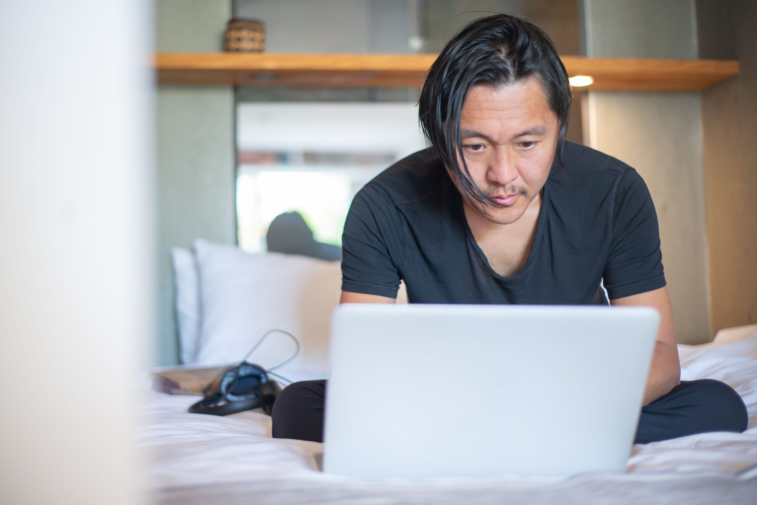 Freelancer working on a laptop setting up freelance gigs