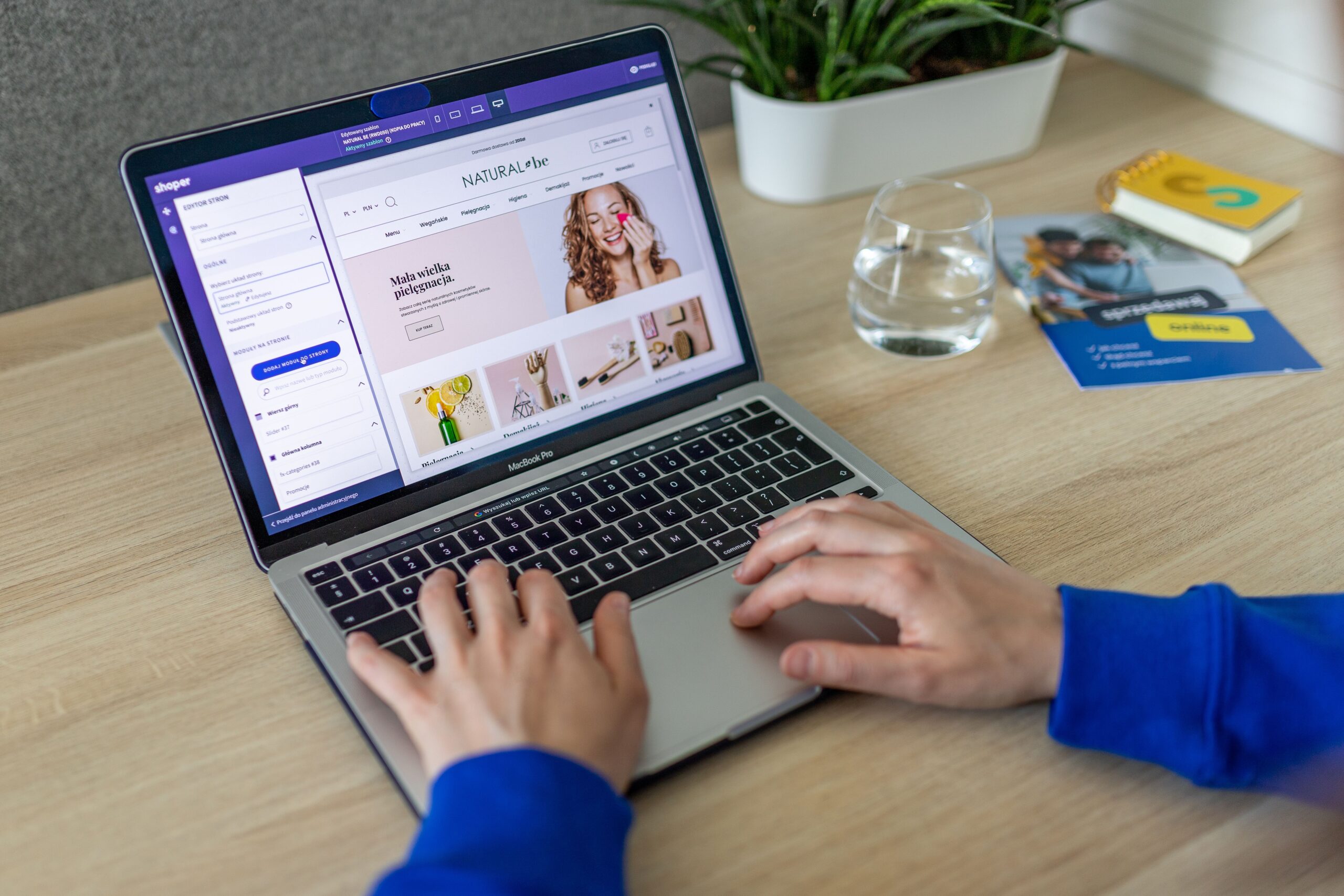Reviewing a website project on a laptop for a portfolio piece