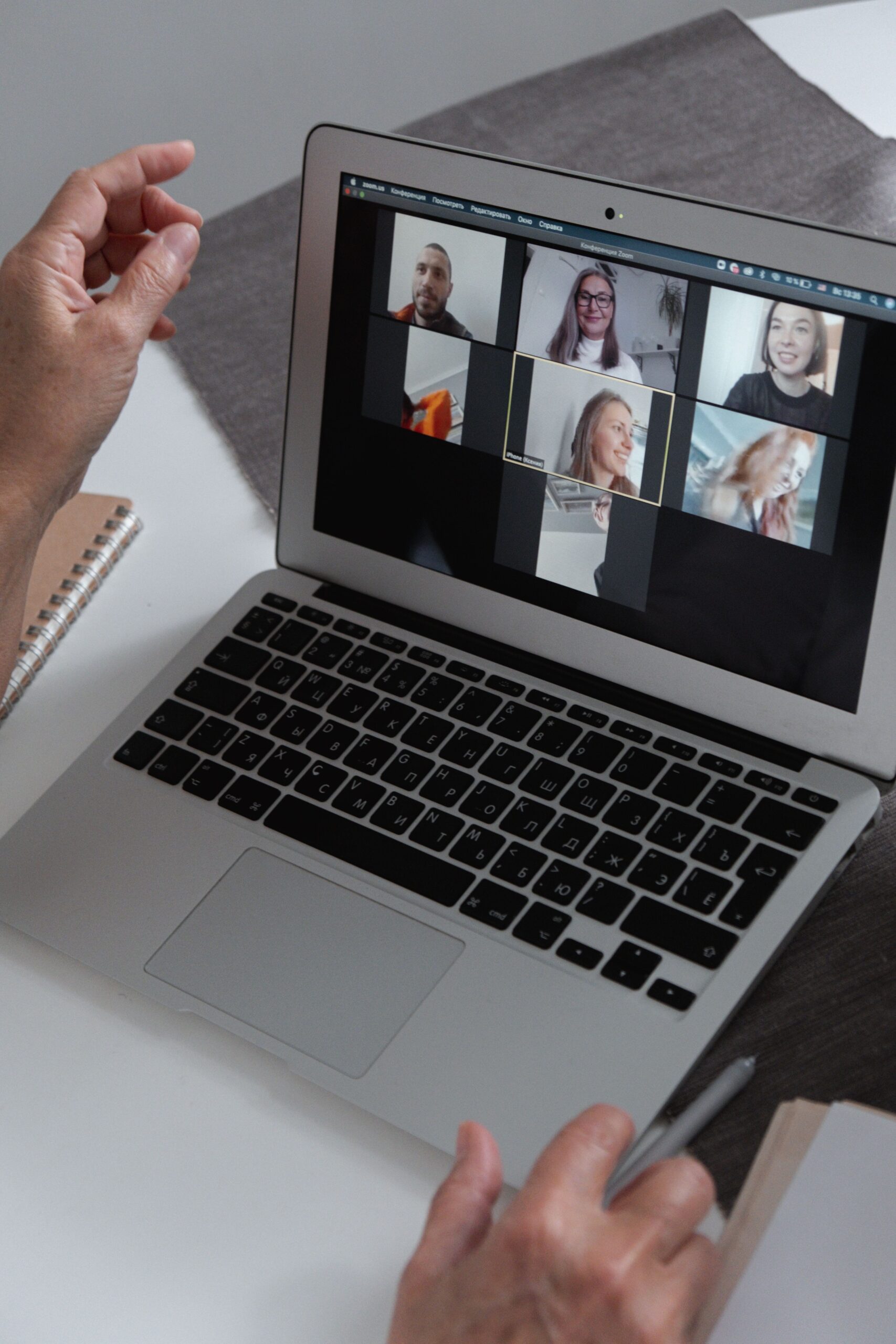 Video call with international clients on a laptop